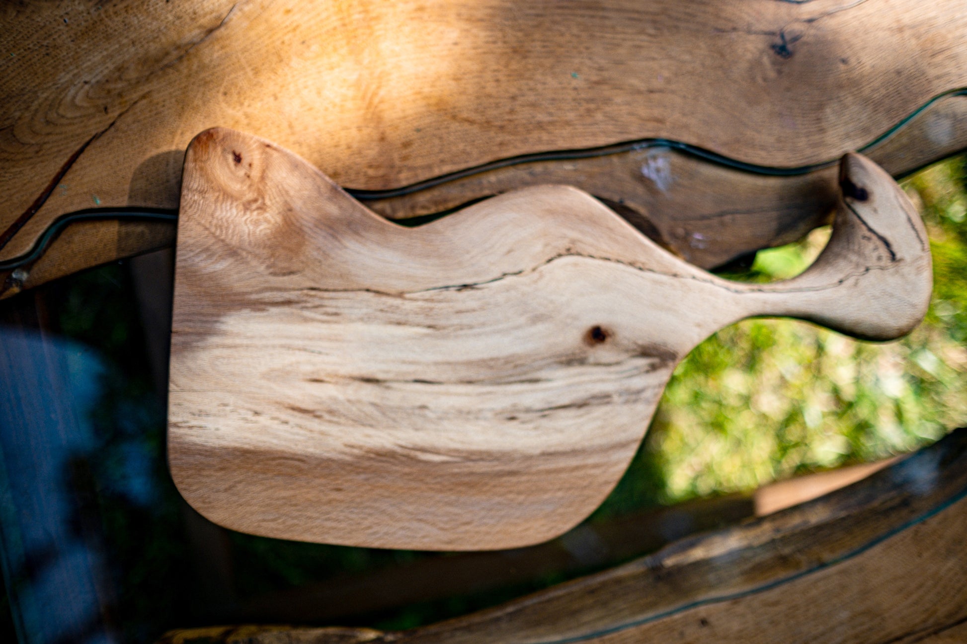 Meet L'Oiseau, a truly unique deli tray that masterfully combines both functionality and artistic charm. This exquisite wooden sculpture is carefully handcrafted from the finest wood, showcasing a Live Edge finish that accentuates its natural allure. Its distinctive and whimsical design, highlighted by a delightful bird-like head, takes your dining experience to an entirely new dimension.