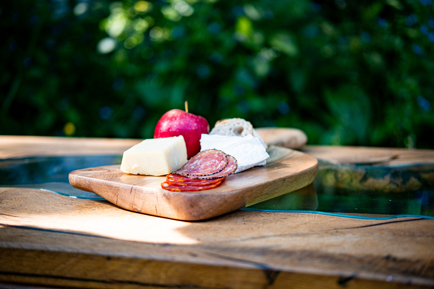 Introducing L'Oiseau, a truly exceptional deli tray that seamlessly blends functionality and artistic allure. This exquisite wooden sculpture is meticulously handcrafted from the finest wood, featuring a Live Edge finish that accentuates its innate beauty.Boasting graceful curves, L'Oiseau is destined to enrich every facet of your culinary journey, whether you're entertaining guests, relishing a laid-back meal, or seeking a striking addition to your kitchen decor.