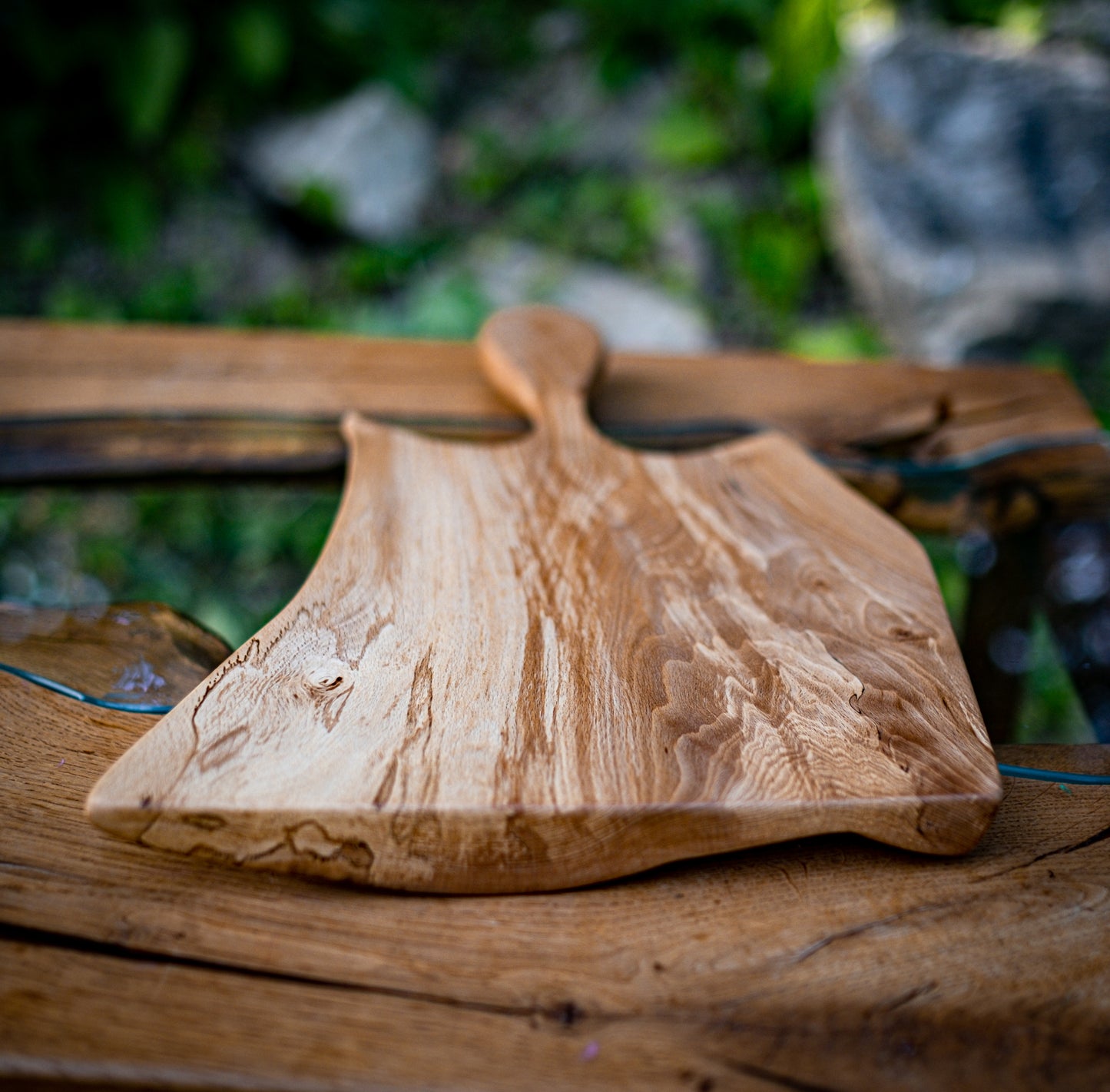 Unveil "The Guest" by Live Edge Creations, a captivating fusion of wood sculpture and functional deli tray expertly hewn from spalted beech wood. This exceptional creation boasts Live Edges and graceful curves, evoking the essence of a gracious persona. Elevate your culinary presentation and make an indelible mark on your guests with this unique piece.