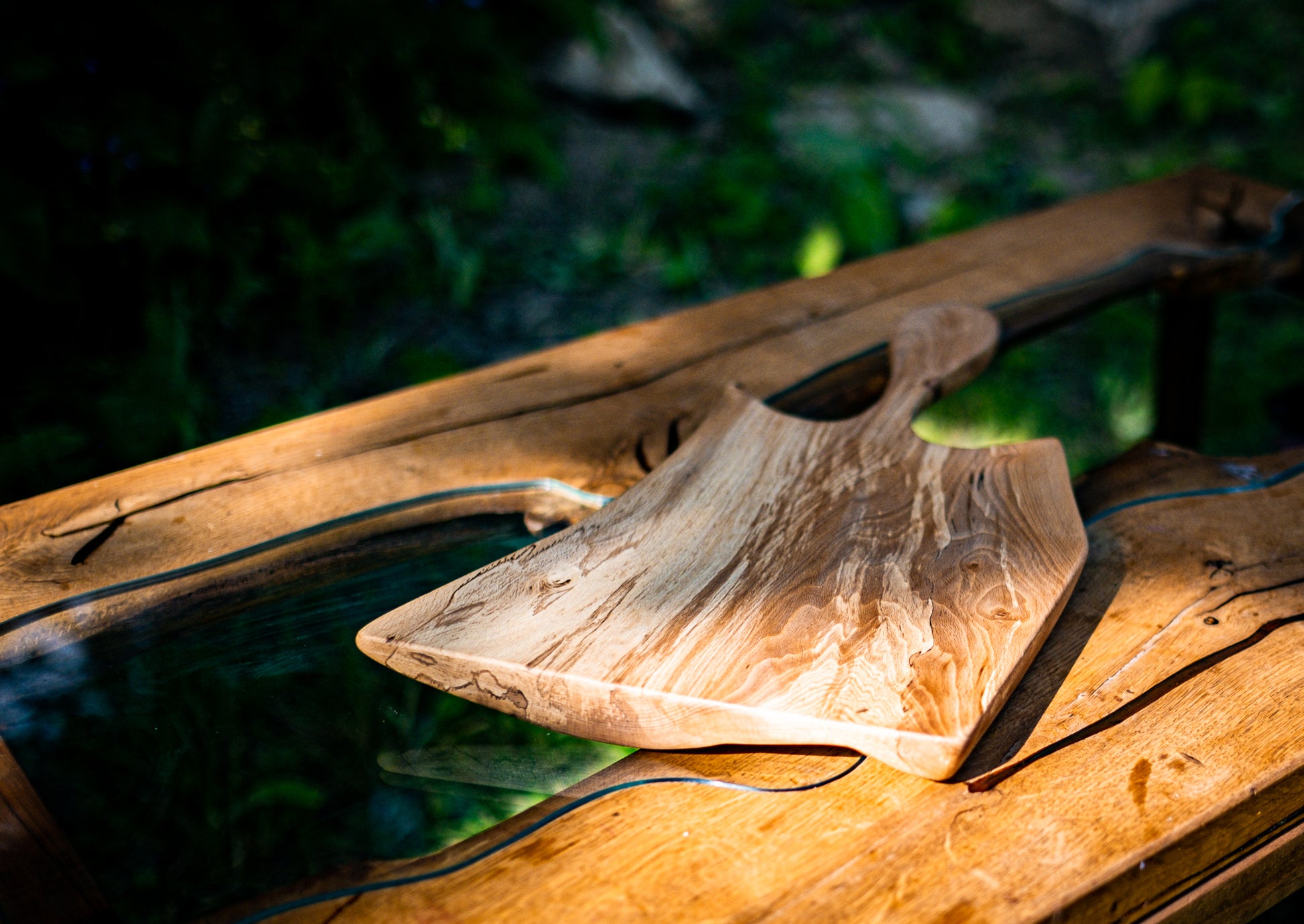 Introducing "The Guest" by Live Edge Creations, a remarkable wood sculpture and functional deli tray crafted from spalted beech wood. This unique piece features Live Edges and graceful curves, reminiscent of a gracious persona. It's the perfect addition to elevate your culinary presentation and leave a lasting impression on your guests. Handcrafted with meticulous care and attention to detail, "The Guest" is a true testament to the beauty of kitchen accessories and bespoke carpentry.