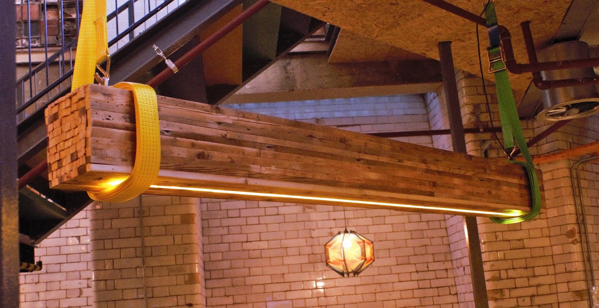 Immerse yourself in Cabana Brixton's ambiance where Live Edge Creations presents a distinctive blend of Bespoke Live Edge Furniture and Art Installations. Seamlessly merging innovation and furniture design, we hold expertise in commercial interior concepts. We embark on sustainable initiatives, crafting from recycled materials. Our space is graced with a chandelier, a heavyweight light fixture suspended from the ceiling.