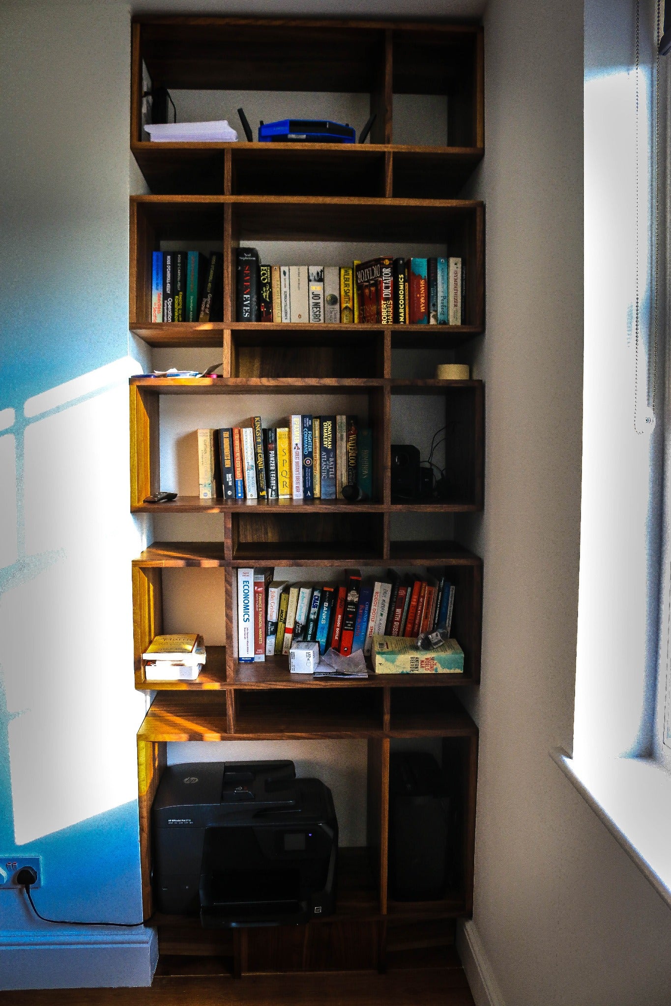 Indulge in the craftsmanship of Live Edge Creations with our meticulously handcrafted black walnut wood bookcase. Infuse your surroundings with a sense of individuality through our distinct Live Edge Shelving, tailored to harmonise with your preferences and needs. Delve into an assortment of top-notch wooden shelves. Elevate your living space's aesthetic by embracing the innate elegance of nature's most exquisite materials.