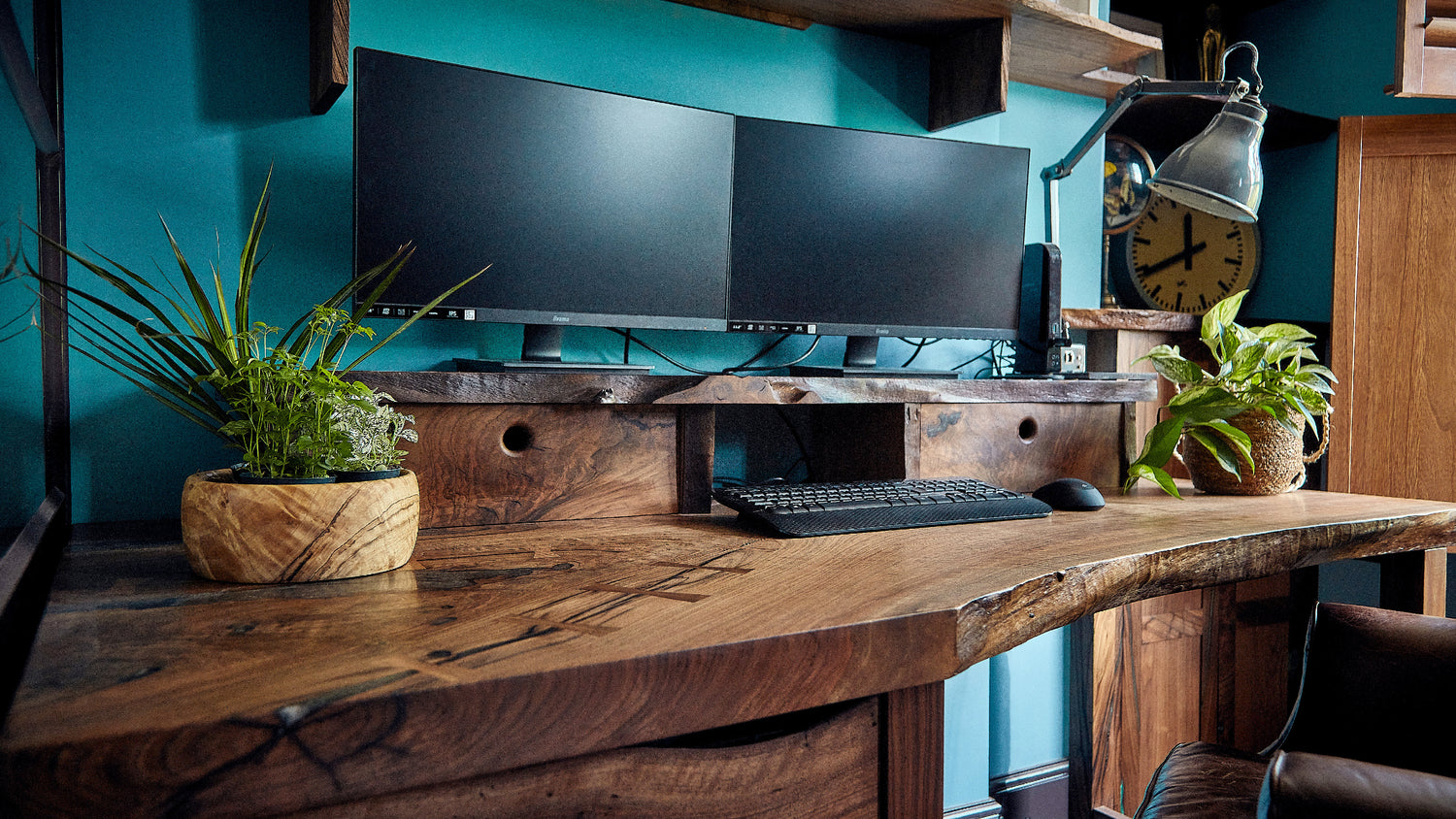 Live Edge Creation presents a custom designed, high quality wood, Black Walnut office desk. This stunning piece exudes charm with its raw and natural edges. A large wood slab table , with drawers and ample space for multiple monitors and storage. The Live edge design is fortified and sturdy, aesthetically pleasing and functional, making it an amazing introduction to any living space.