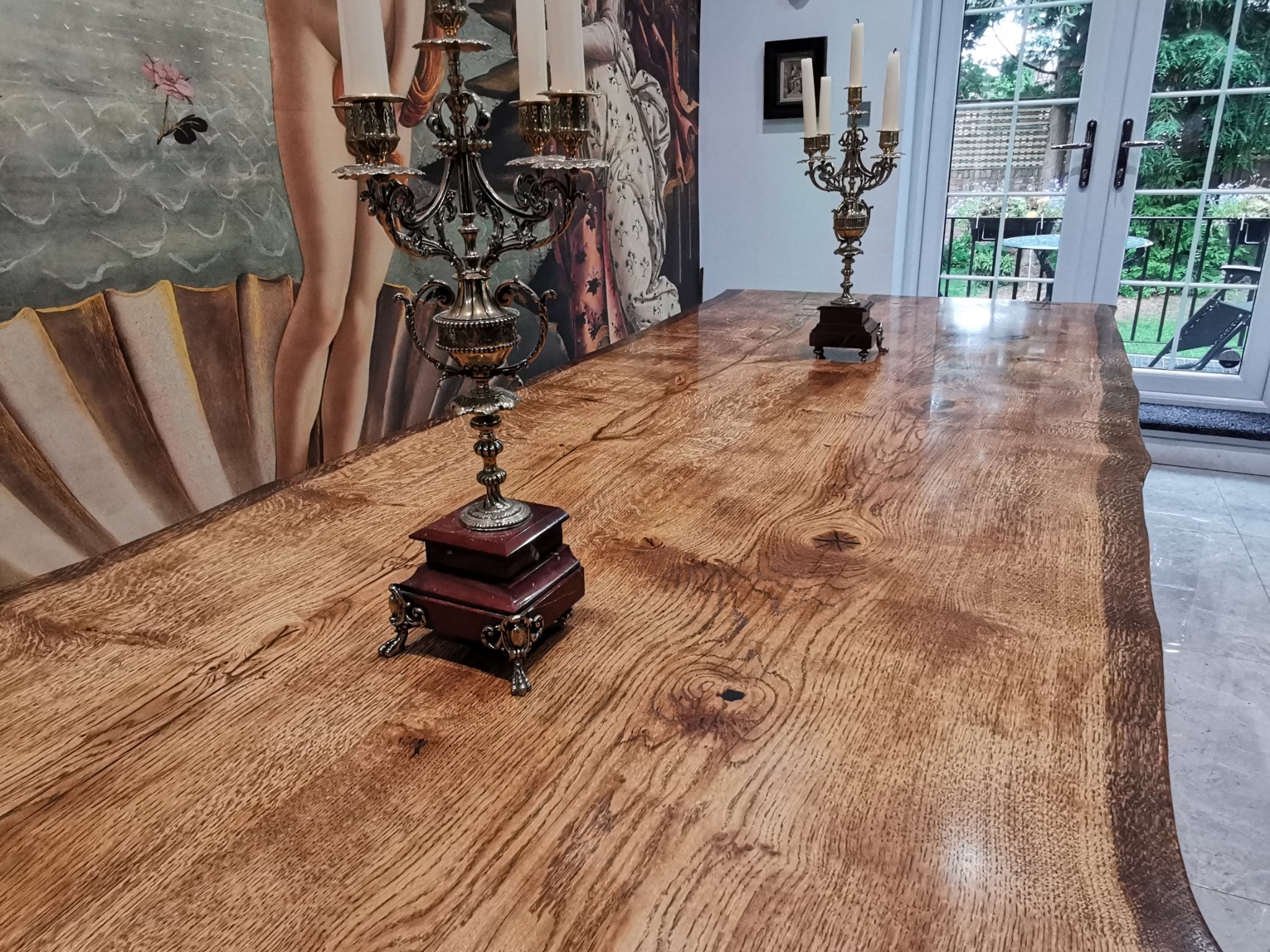 Experience the timeless elegance and charm of a Live Edge dining table meticulously crafted from a Black Walnut wooden slab, featuring raw and natural edges. Each piece is a stylish and bespoke masterpiece, handcrafted with the utmost precision and using the highest quality wood available. Elevate your dining experience with this exquisite and unique table that seamlessly blends artistry with functionality.