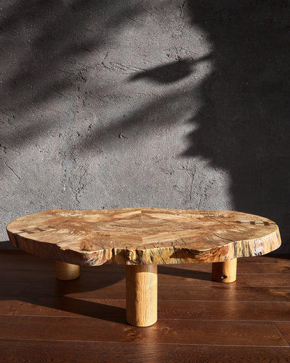 Introducing the 'Cocoon Coffee Table' by Live Edge Tables. This coffee table showcases the exquisite grain of spalted beech Live Edge wood, infusing your space with organic and rustic charm while becoming a stunning interior centrepiece. As functional as it is stylish, this table boasts a solid wood slab with a meticulously detailed pattern achieved through the artful book-matching joinery technique.