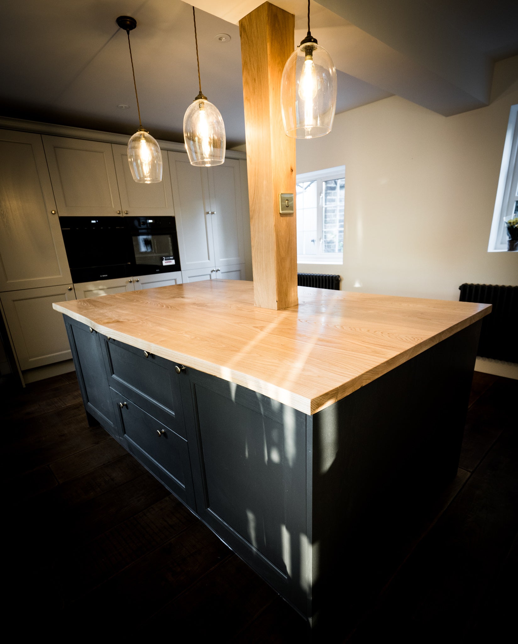 Discover the allure of Live Edge Creations as we unveil a Sweet Chestnut wood kitchen island, adorned with untamed live edges that infuse rustic charm and organic beauty into your culinary haven. Crafted with the utmost precision using high-quality wood, this kitchen island features a sleek, contemporary design in a captivating light beige hue. Elevate your kitchen with this countertop centrepiece that not only looks amazing but also beckons warmth and hospitality